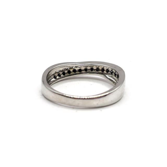 18ct white gold diamond ring featuring a sparkling central diamond and elegant design, unbranded jewelry piece.