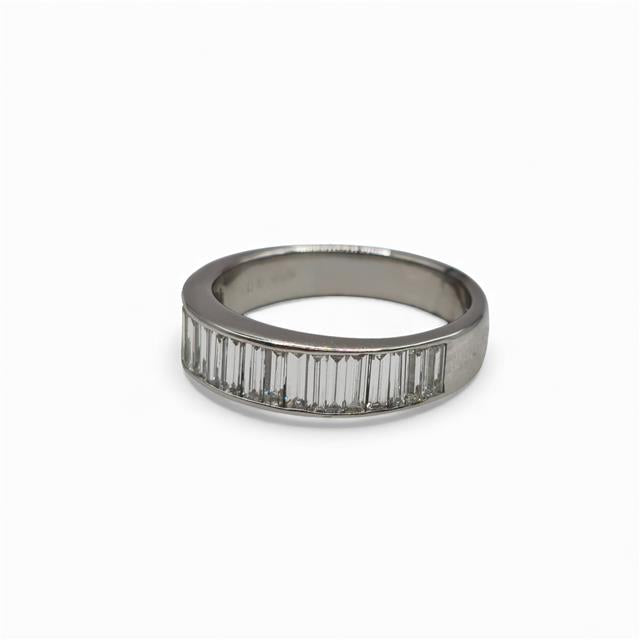 18ct white gold diamond ring with a sparkling central diamond, elegant jewelry piece showcasing fine craftsmanship.