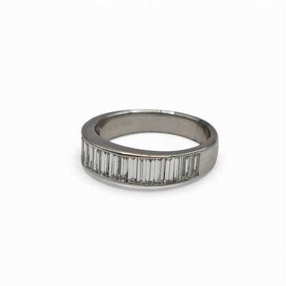 18ct white gold diamond ring with a sparkling central diamond, elegant jewelry piece showcasing fine craftsmanship.