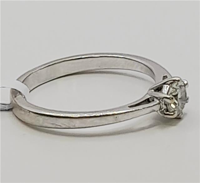 18ct white gold diamond ring in size I 1/2, featuring sparkling diamonds and a sleek band design.