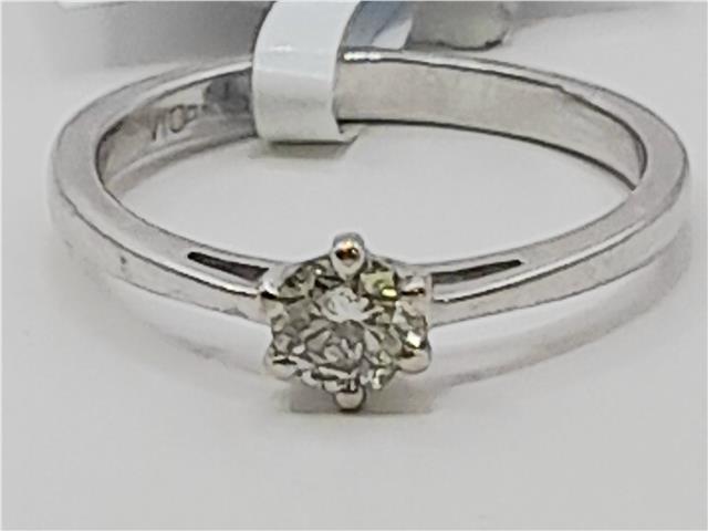 18ct white gold diamond ring in size I 1/2 with sparkling diamonds, showcasing a sleek and elegant design.