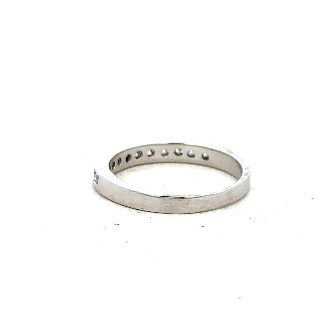 18ct white gold diamond ring size J with sparkling diamonds, unbranded jewelry piece showcasing elegant design and fine craftsmanship.
