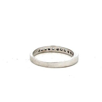 18ct white gold diamond ring in size J with sparkling diamonds, showcasing elegant craftsmanship and a classic design.