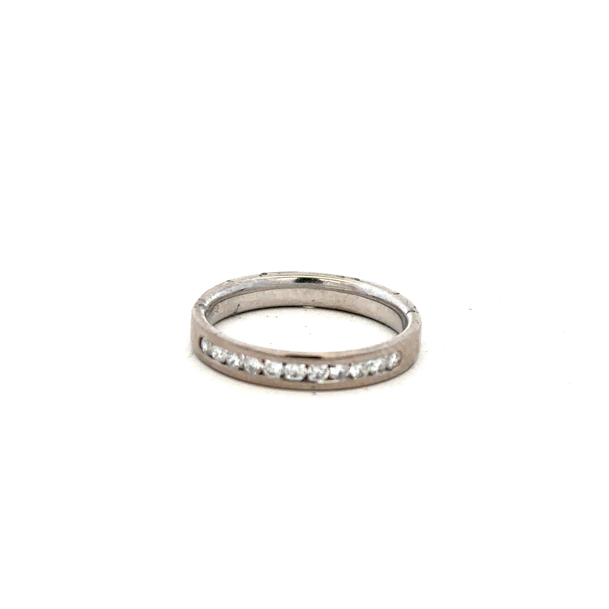 18ct white gold diamond ring in size J1/2 with sparkling diamonds, displayed on a neutral background.