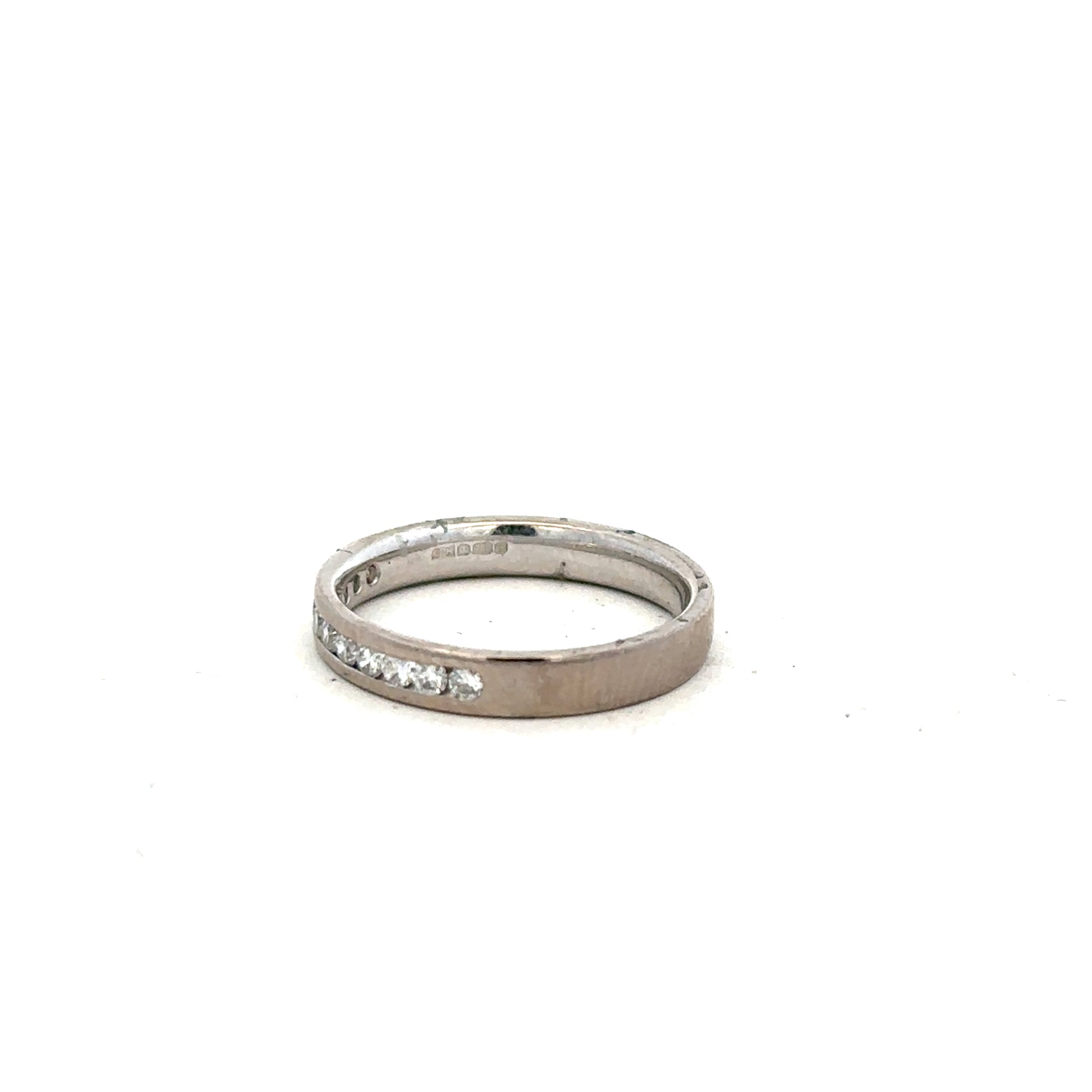18ct white gold diamond ring in size J1/2, featuring a sparkling diamond set in an elegant unbranded design.