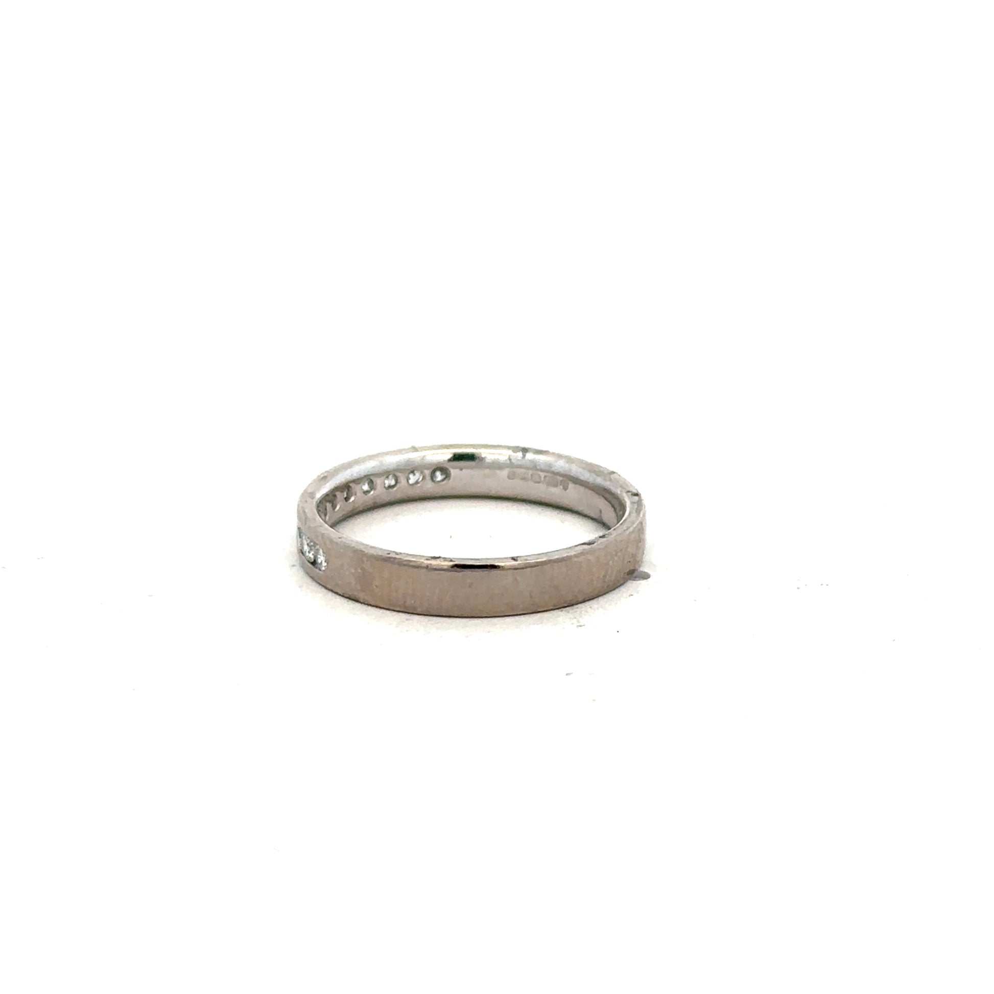 18ct white gold diamond ring in size J1/2 with sparkling diamonds, showcasing elegant jewelry craftsmanship.