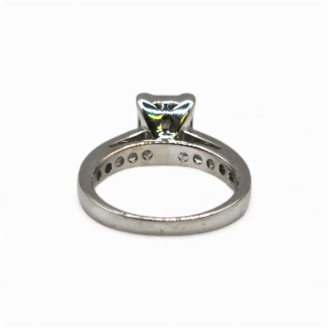 18ct white gold diamond ring in size J1/2 with sparkling diamonds, showcasing elegant jewelry craftsmanship.