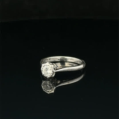 18ct white gold diamond ring in size K with sparkling diamonds, elegant jewelry piece on a neutral background.