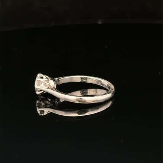 18ct white gold diamond ring in size K featuring a sparkling diamond setting, unbranded jewelry piece.