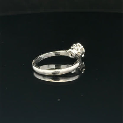 18ct white gold diamond ring in size K, featuring a sparkling diamond centerpiece and a sleek, elegant design.