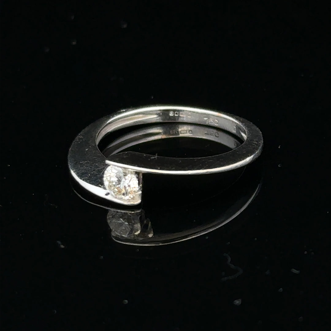 Unbranded 18ct white gold diamond ring in size K1/2, featuring a sleek design with sparkling diamonds.