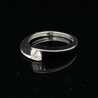 Unbranded 18ct white gold diamond ring in size K1/2, featuring a sleek design with sparkling diamonds.