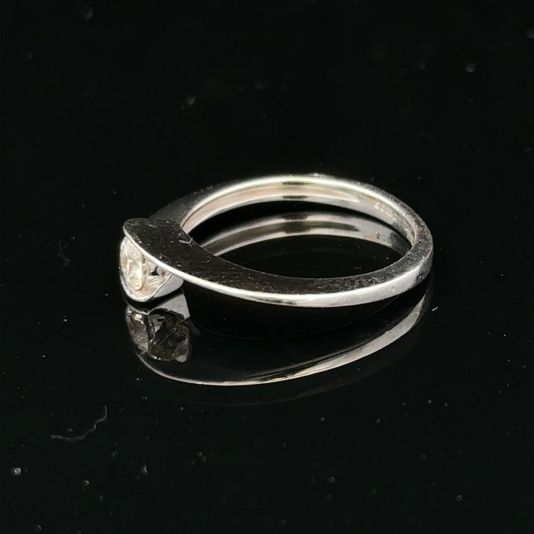 Unbranded 18ct white gold diamond ring size K1/2 with sparkling diamonds, shown on a white background.