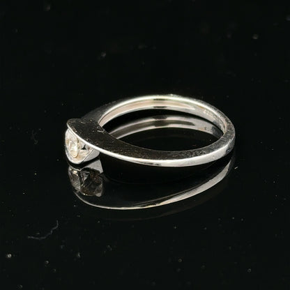 Unbranded 18ct white gold diamond ring size K1/2 with sparkling diamonds, shown on a white background.