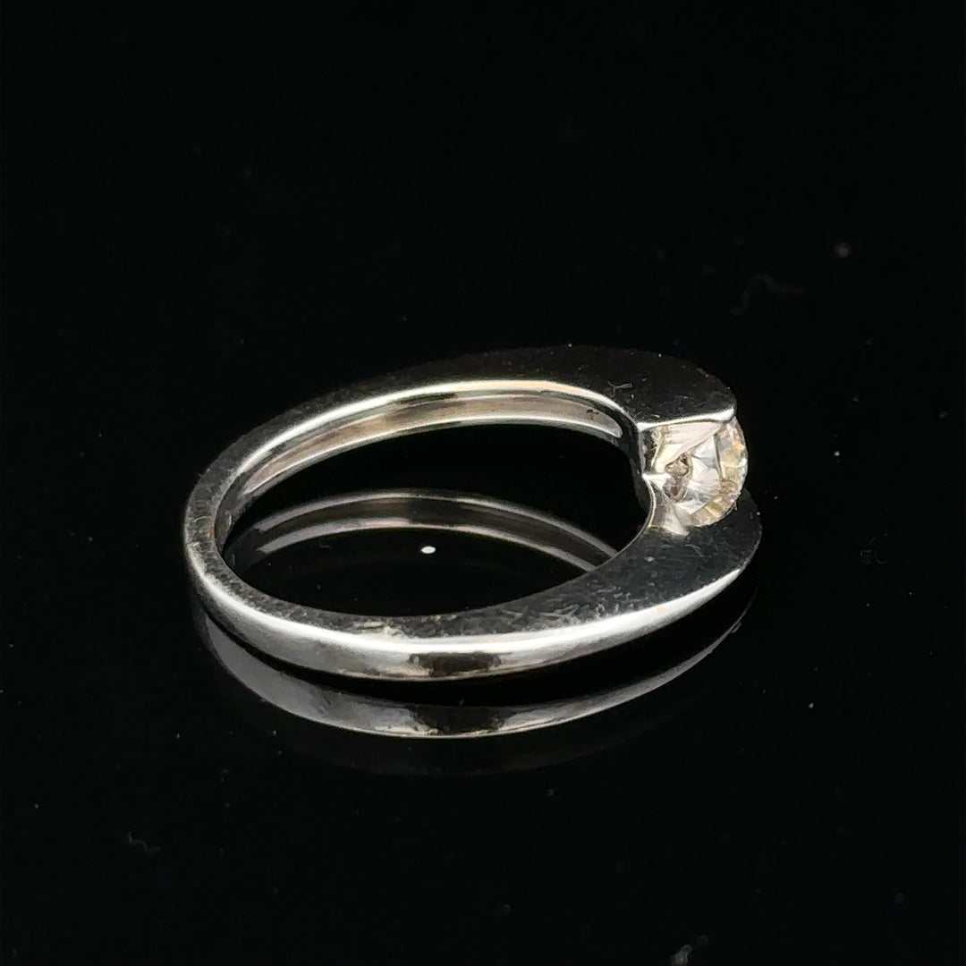 Unbranded 18ct white gold diamond ring size K1/2 with sparkling diamonds, close-up view of elegant jewelry design.