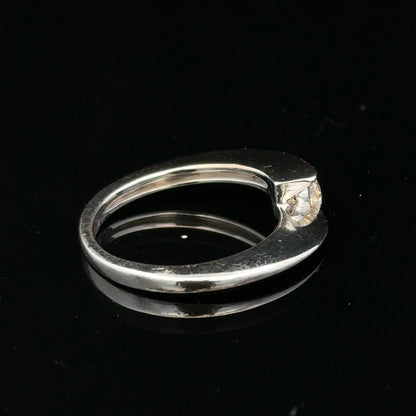 Unbranded 18ct white gold diamond ring size K1/2 with sparkling diamonds, close-up view of elegant jewelry design.