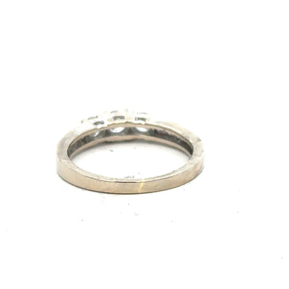 18ct white gold diamond ring in size L with sparkling diamonds, showcased in a close-up of the elegant jewelry piece.