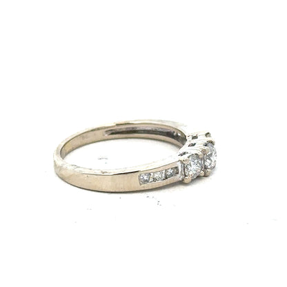 18ct white gold diamond ring in size L with sparkling diamonds, unbranded jewelry showcasing elegant craftsmanship.