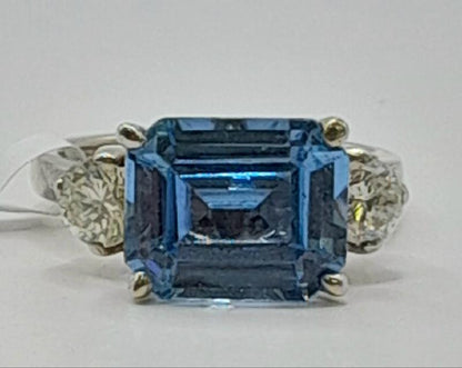 18ct white gold diamond ring in size M with sparkling diamonds, elegant jewelry piece with a sleek band design.