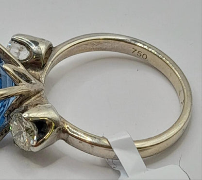 18ct white gold diamond ring in size M with sparkling diamonds, elegant jewelry piece.