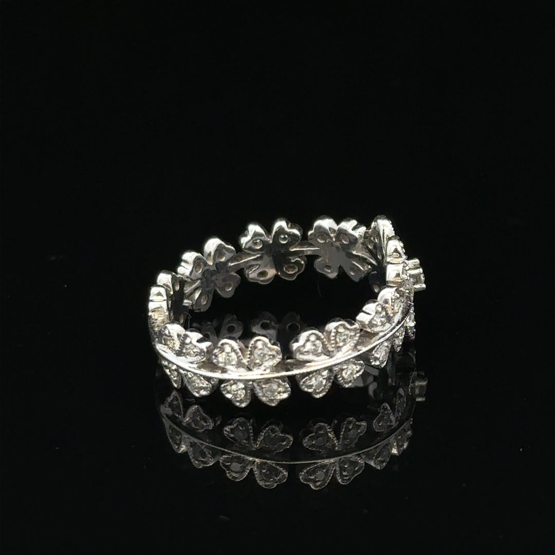 18ct white gold diamond ring in size N, elegant jewelry with sparkling diamonds on a sleek band.