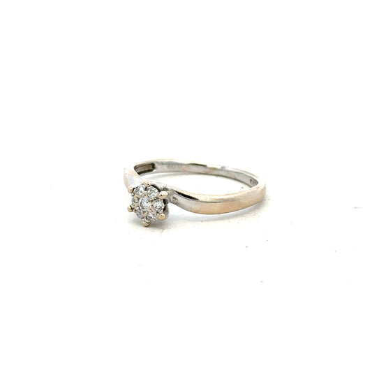 18ct white gold diamond ring in size N with sparkling diamonds, showcasing elegant craftsmanship and a classic design.