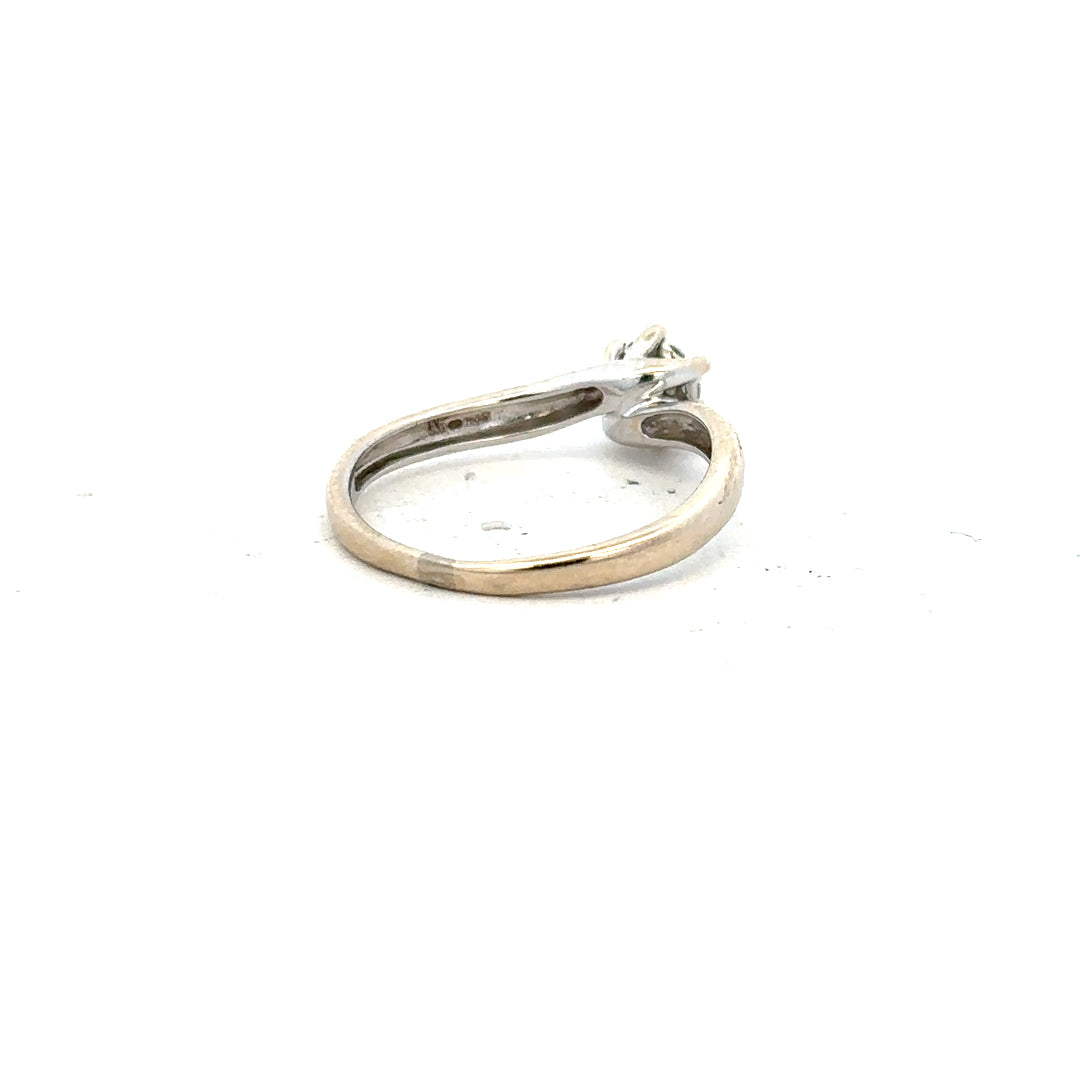 18ct white gold diamond ring in size N featuring a sparkling diamond, elegant jewelry piece with a sleek band.