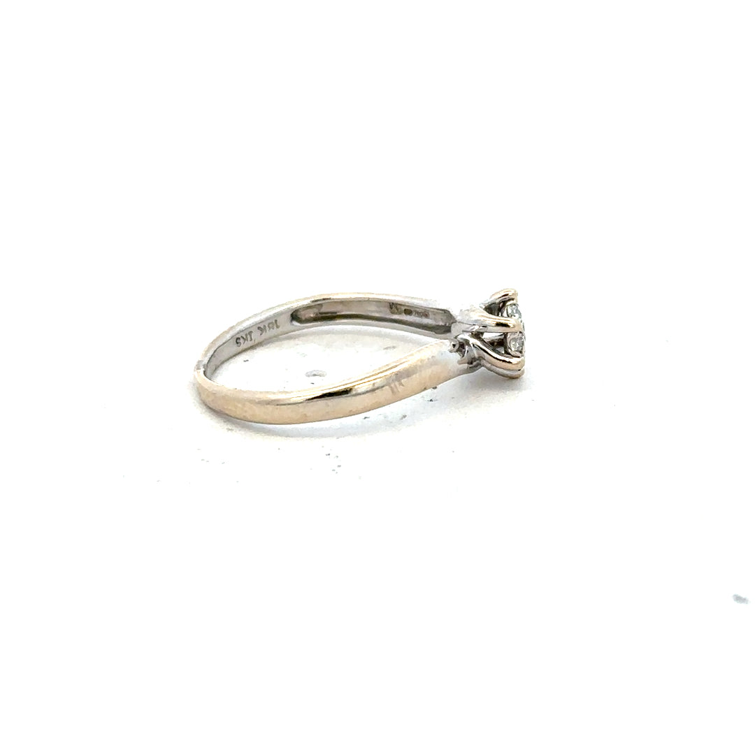 18ct white gold diamond ring in size N with sparkling diamonds, featuring a sleek and elegant design.