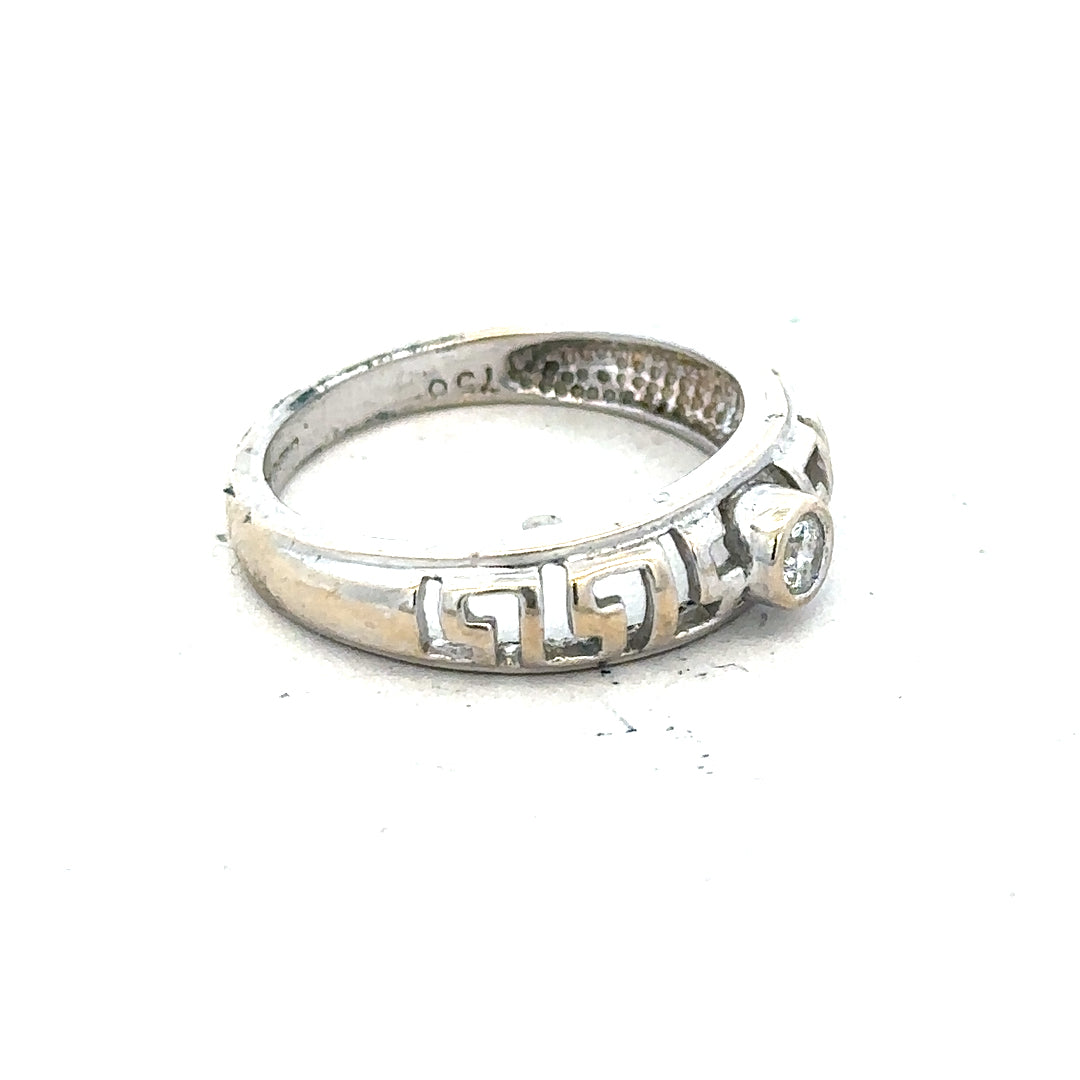 18ct white gold diamond ring in size N with a central diamond, showcasing elegant jewelry craftsmanship.