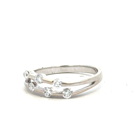 18ct white gold diamond ring size O featuring sparkling diamonds, elegant jewelry piece with a classic design.