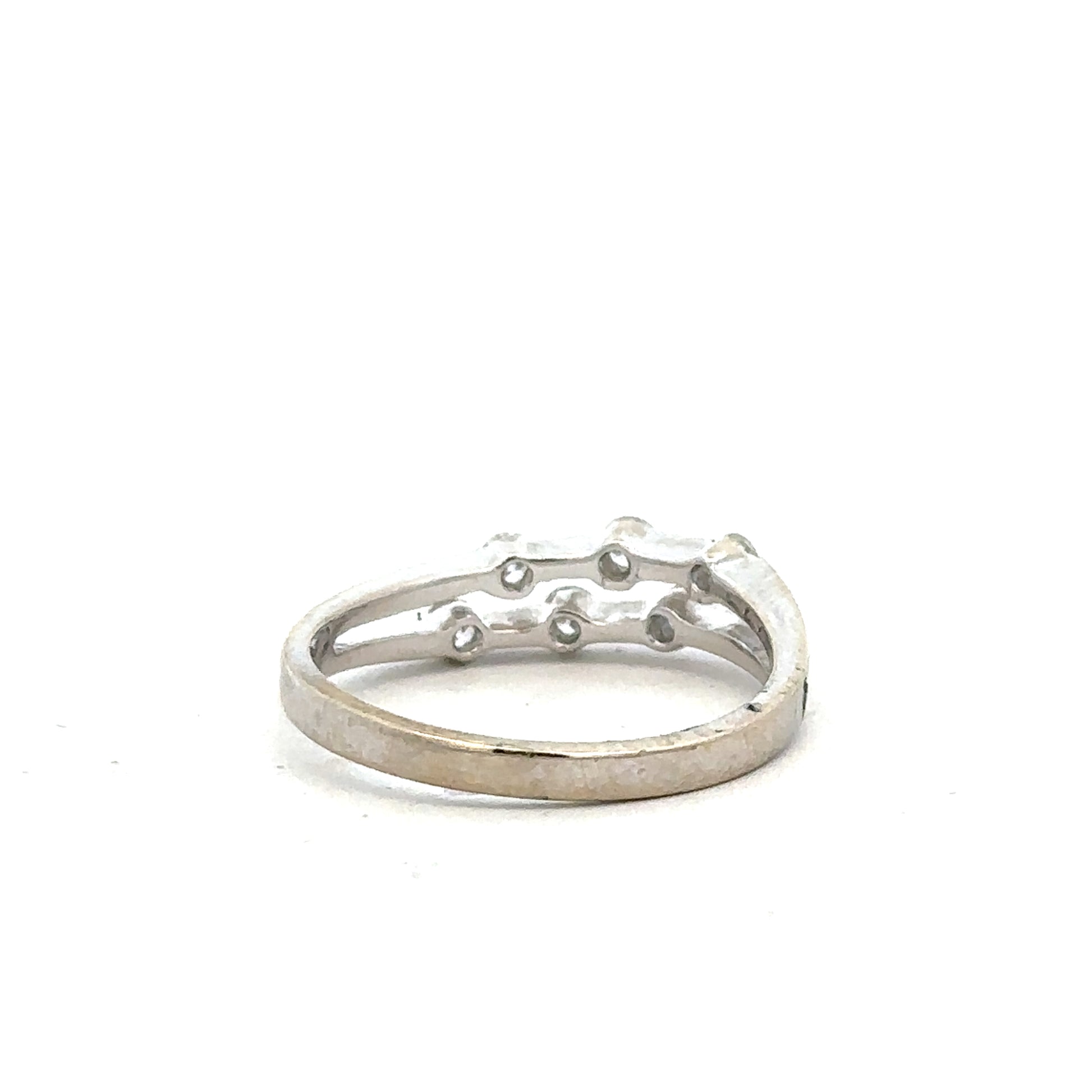 18ct white gold diamond ring in size O with sparkling diamonds, unbranded jewelry piece with elegant design.