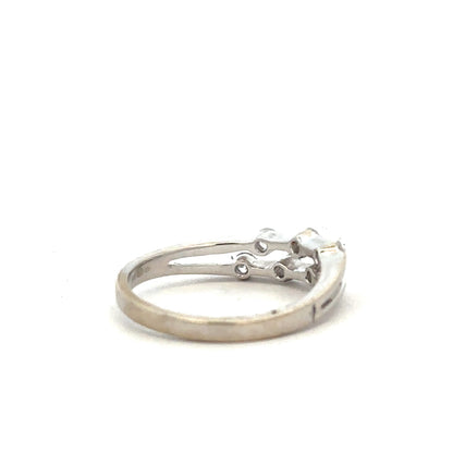 18ct white gold diamond ring in size O with sparkling diamonds, elegant jewelry piece with a sleek design.