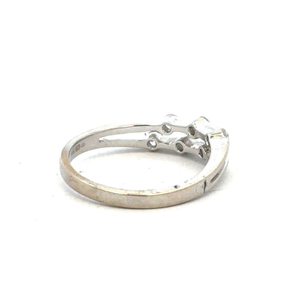 18ct white gold diamond ring in size O with sparkling diamonds, showcasing elegant craftsmanship and a classic design.