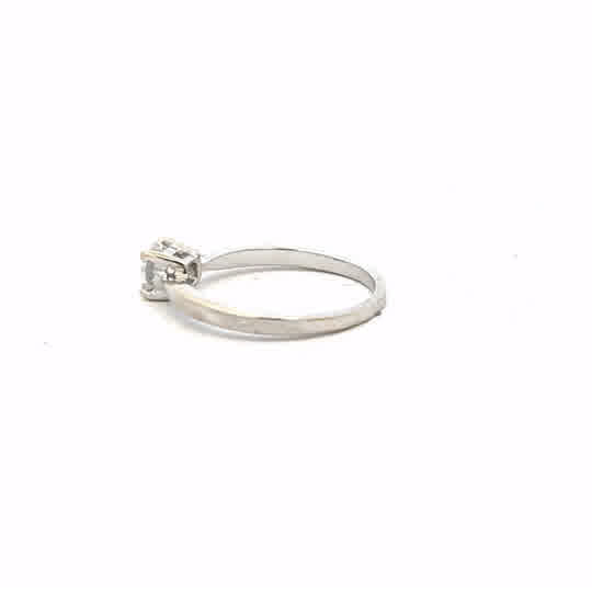 18ct white gold ring size J1/2 with a smooth polished band, unbranded jewelry piece.