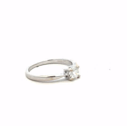 18ct white gold ring size J1/2 with a smooth polished finish, unbranded jewelry displayed on a neutral background.