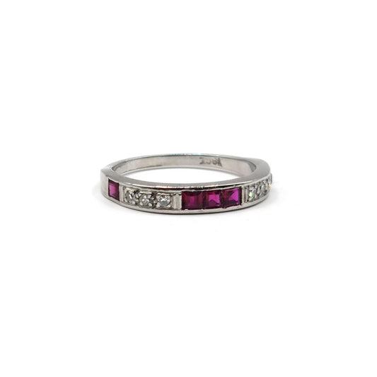 18ct white gold ruby and diamond half eternity ring with alternating gemstones and a polished band, unbranded jewelry design.