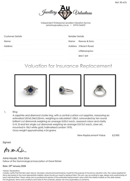 18ct white gold sapphire and diamond ring featuring a central sapphire gemstone and sparkling diamonds on a sleek band.