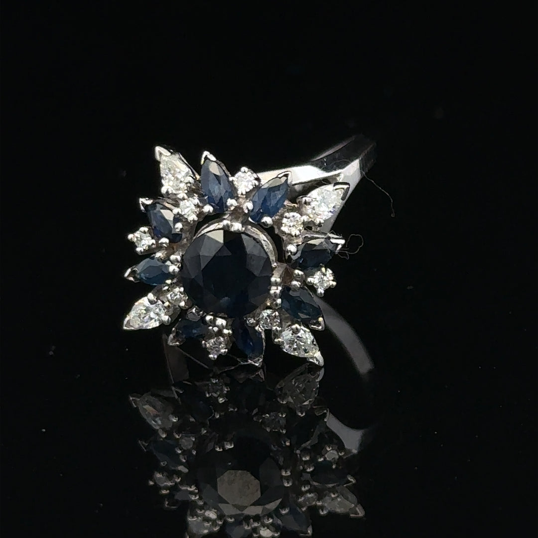 18ct white gold sapphire and diamond ring in size N1/2, featuring a sparkling gemstone and elegant design.