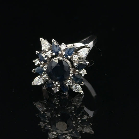 18ct white gold sapphire and diamond ring in size N1/2, featuring a sparkling gemstone and elegant design.