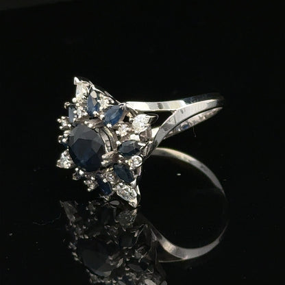 18ct white gold sapphire and diamond ring, size N1/2, featuring a sparkling gemstone and elegant design.