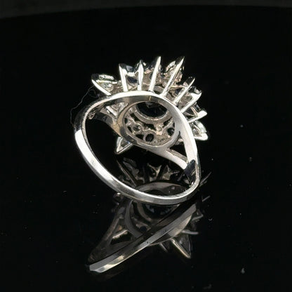 Elegant 18ct white gold sapphire and diamond ring in size N1/2, featuring a sparkling central sapphire and surrounding diamonds.