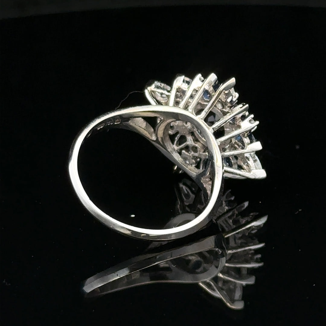 18ct white gold sapphire and diamond ring in size N1/2, showcasing a sparkling gemstone and elegant design.