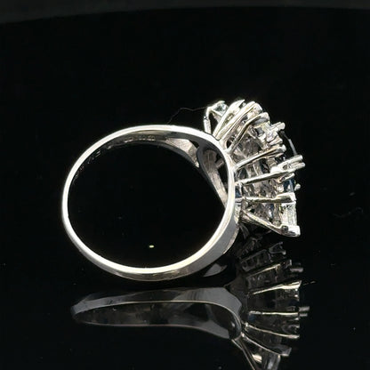 18ct white gold sapphire and diamond ring in size N1/2, featuring a sparkling gemstone and elegant design.