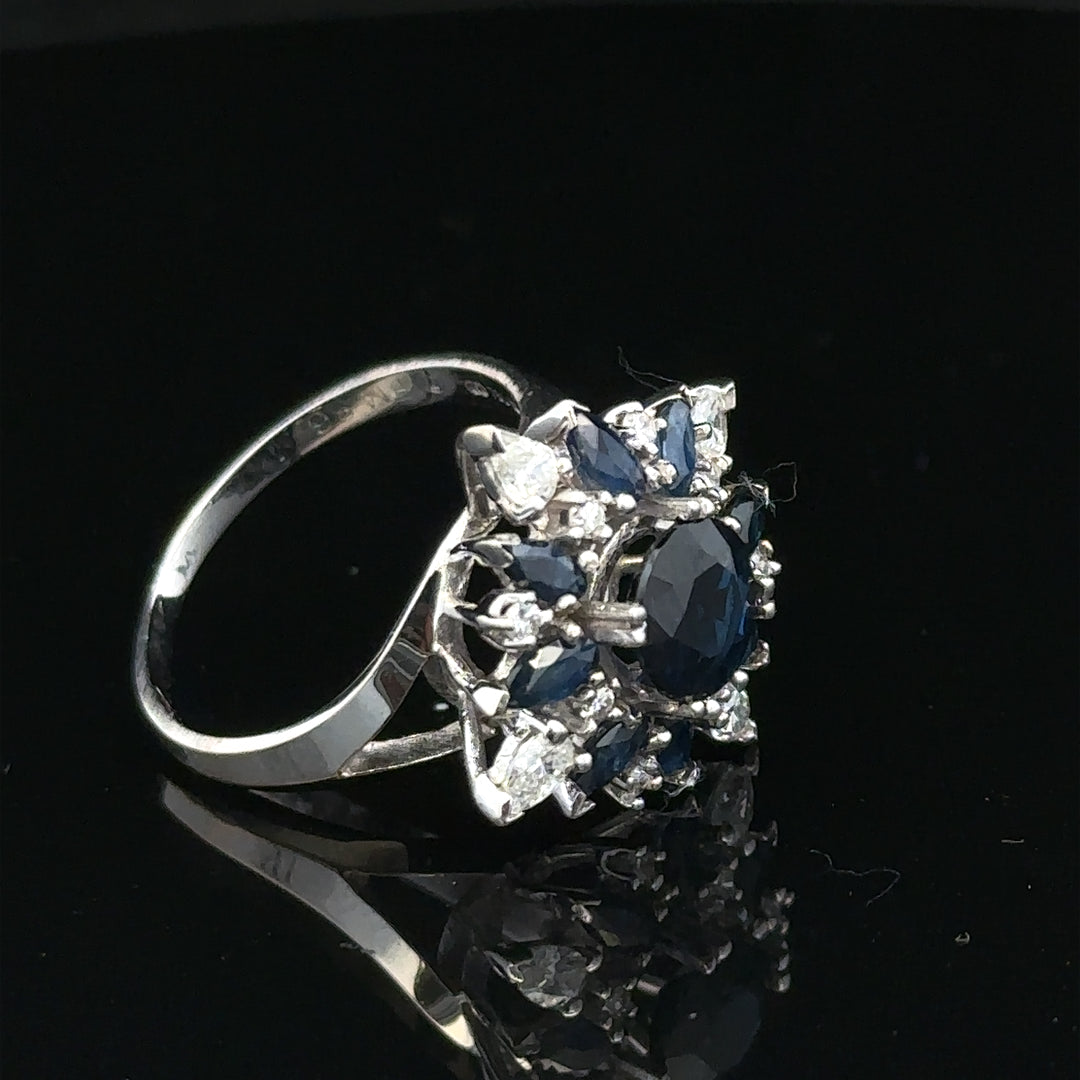 18ct white gold sapphire and diamond ring in size N1/2, featuring a sparkling sapphire and diamond accents on a sleek band.