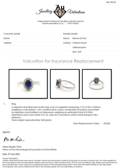 18ct white gold sapphire and diamond ring featuring a central blue sapphire gemstone and sparkling diamonds.