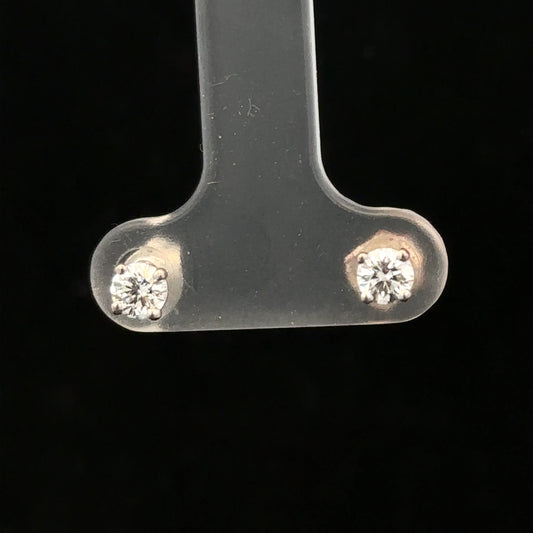 18ct white gold diamond stud earrings with 0.40 carats, featuring classic round-cut diamonds and a secure stud setting.