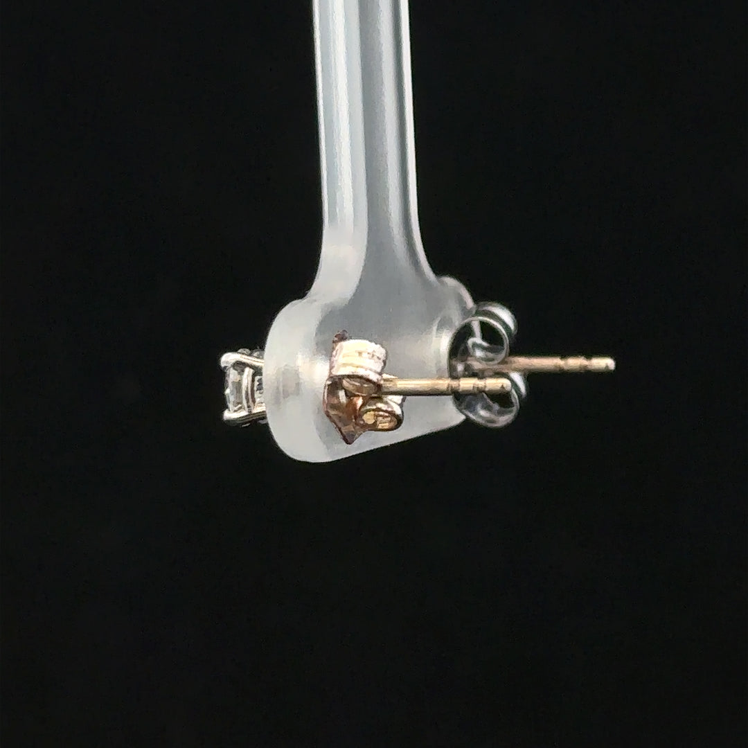 18ct white gold diamond stud earrings with 0.40 carats of sparkling diamonds, elegant and timeless jewelry for women.
