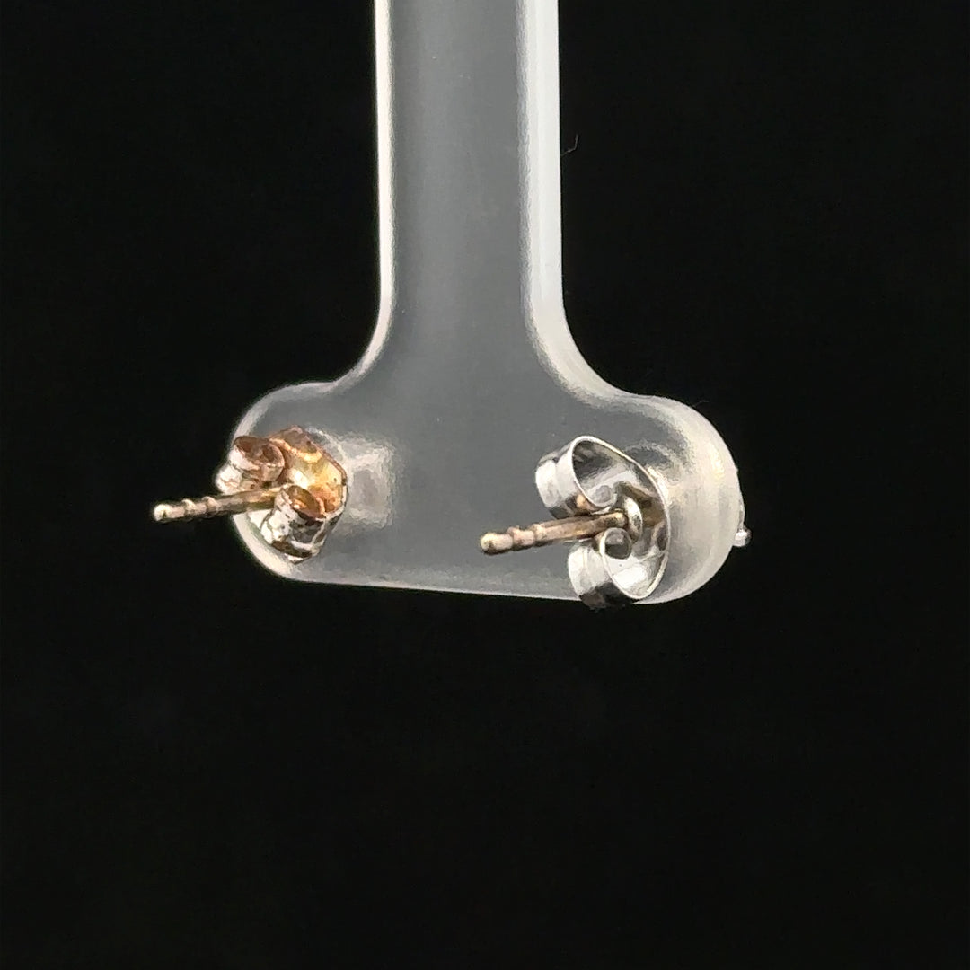 18ct white gold stud earrings with 0.40 carat diamonds, featuring classic and elegant design.