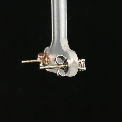 18ct white gold diamond stud earrings with 0.40 carats, showcasing elegant, sparkling diamonds set in a classic design.