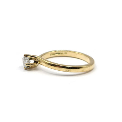18ct yellow gold solitaire diamond ring with 0.35 carats and H color, featuring a classic design and a sparkling central diamond.